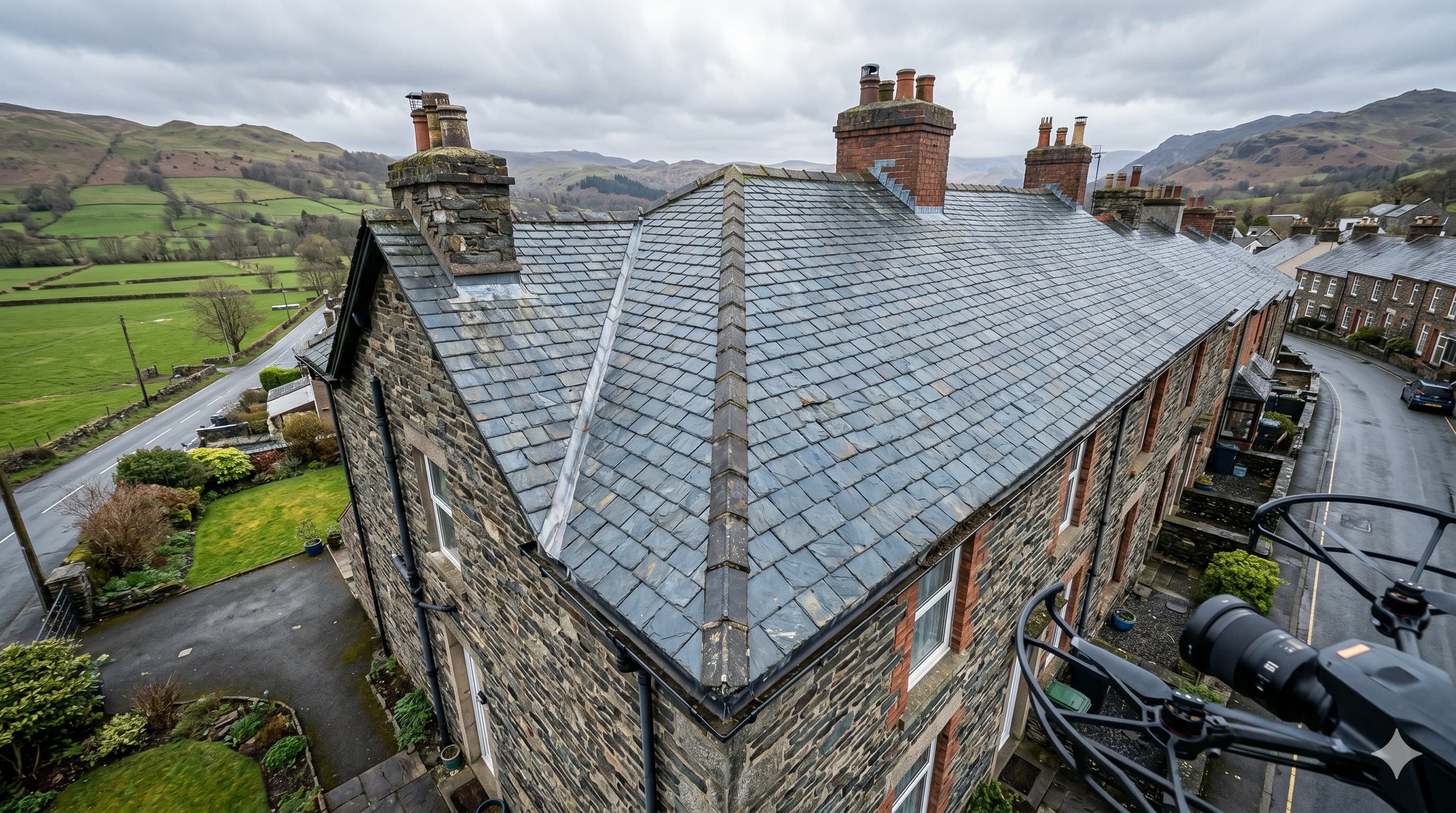 Aerial drone view of a Cumbrian roof inspection by EA Roofing Services